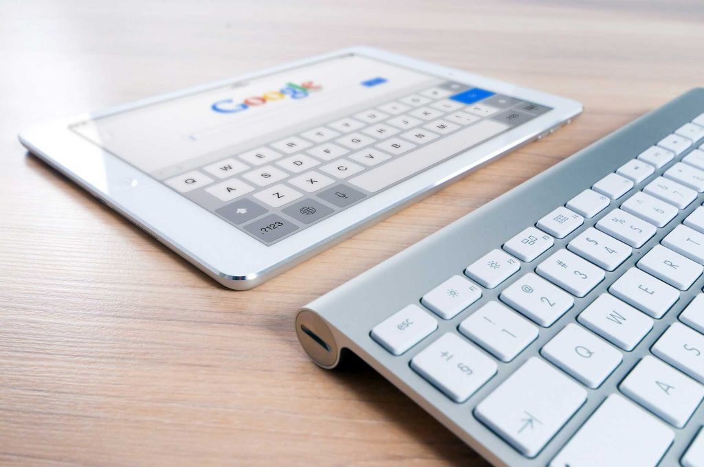 Google search on tablet with keyboard